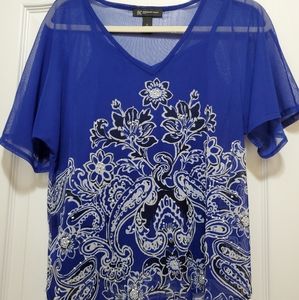 Blue floral blouse with sparkles.